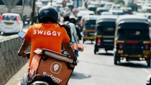 Swiggy-Ltd.s-rider-on-a-bike-on-road-in-Mumbai.-Photo-Vivek-Amare-Source-NDTV-Profit-13112024